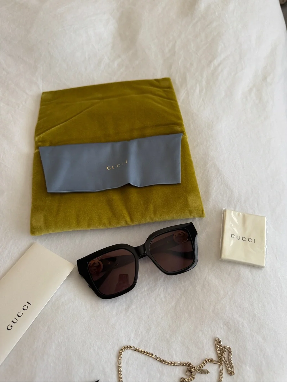 Gucci gold chain sunglasses with brown lenses